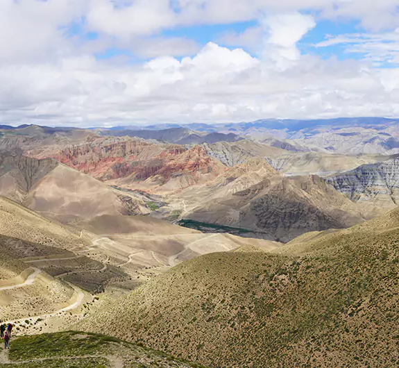 Desert-like landscape of Upper Mustang during the monsoon trek