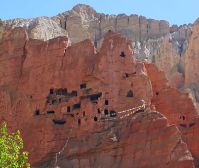 A cave carved in the Cliff as seen from Dhakmar Village