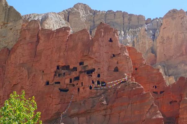 A cave carved in the Cliff as seen from Dhakmar Village