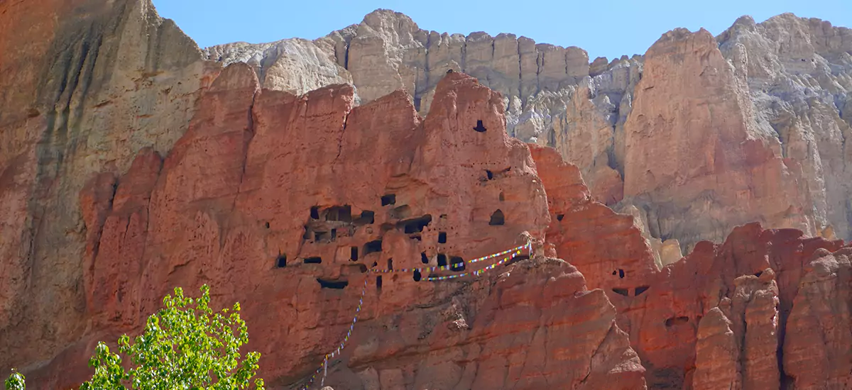 A cave carved in the Cliff as seen from Dhakmar Village