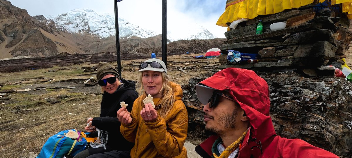 Trekkers at Himlung Base Camp during the Nar Phu Valley Trek